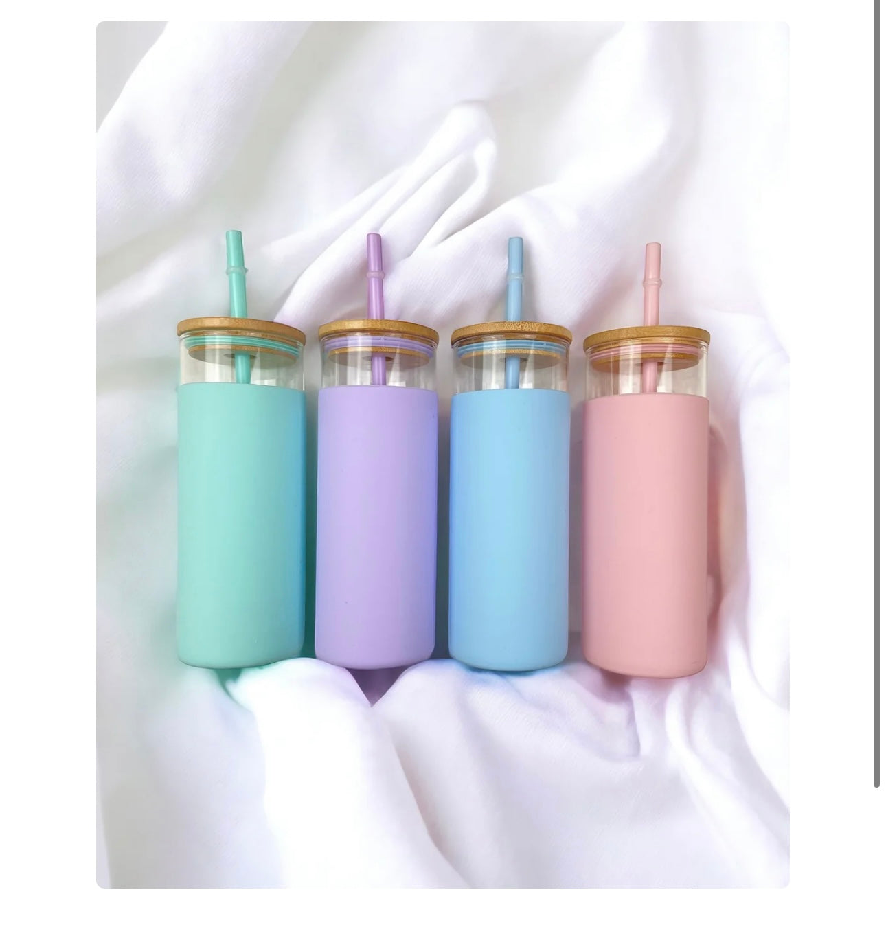 Pastel glass bottle and straw